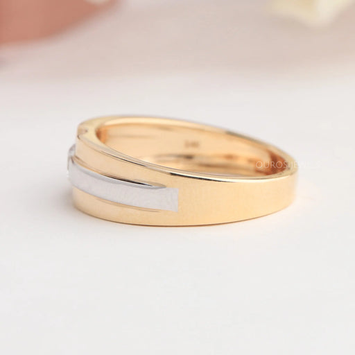 side view of round cut diamond solitaire two-tone men's wedding ring