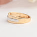 side view of round cut diamond solitaire two-tone men's wedding ring