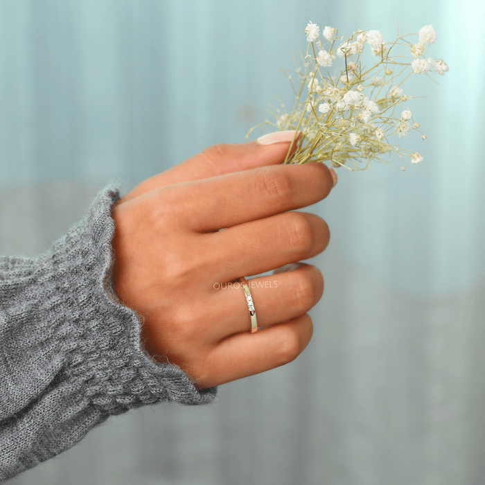 In Finger View Of 18K Yellow Gold 3 Stone Round Diamond Dainty Engagement Ring