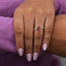 In finger look of red emerald cut lab created diamond ring in two stone setting