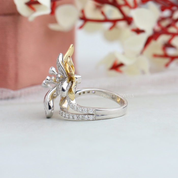 side view of floral-style two-tone round diamond vintage customized engagement ring
