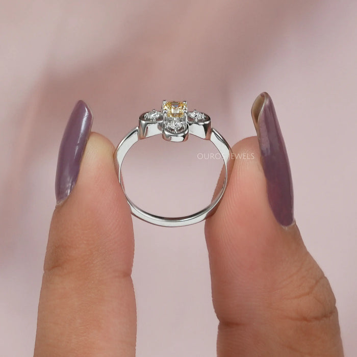 Yellow asscher cut diamond ring two finger view, this vintage engagement ring crafted with 14k white gold with VS clarity.