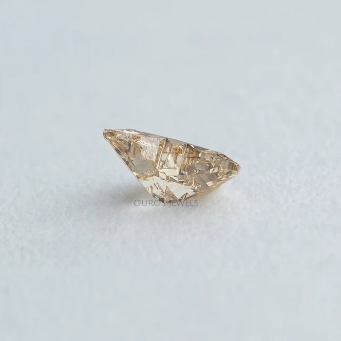 side view of 0.4 carat yellow butterfly synthetic diamond loose