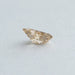 side view of 0.4 carat yellow butterfly synthetic diamond loose
